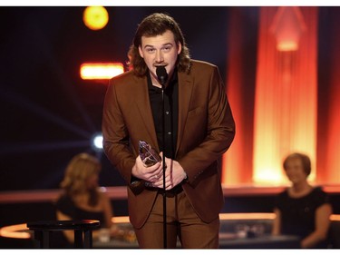 Morgan Wallen accepts and award onstage during the The 54th Annual CMA Awards at Nashville's Music City Center on Wednesday, Nov. 11, 2020 in Nashville, Tennessee.