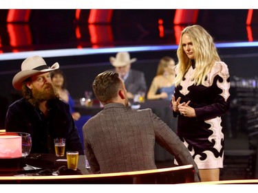 Left to right: John Osborne and T.J. Osborne of Brothers Osborne and Miranda Lambert attend the The 54th Annual CMA Awards at Nashville's Music City Center on Wednesday, Nov. 11, 2020 in Nashville, Tennessee.