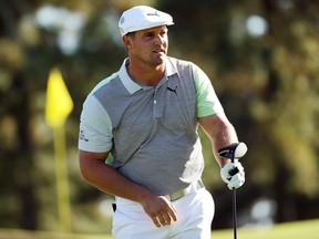 Bryson DeChambeau reacts on the third hole during the second round of the Masters at Augusta National Golf Club on Friday.
