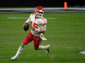 Quarterback Patrick Mahomes #15 of the Kansas City Chiefs scrambles against the Las Vegas Raiders in the second half of their game at Allegiant Stadium on November 22, 2020 in Las Vegas, Nevada. The Chiefs defeated the Raiders 35-31.