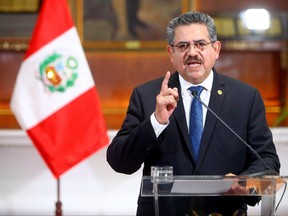 Peru's interim President Manuel Merino announces his resignation in a televised address, in Lima, Peru Nov. 15, 2020.