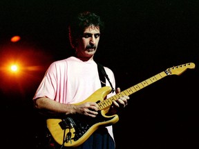 Rock musician Frank Zappa shown at Washington D.C.'s Warner Theater in 1988.