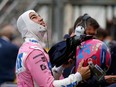 Racing Point's Canadian driver Lance Stroll looks to the sky ahead of the Turkish Formula One Grand Prix at the Intercity Istanbul Park circuit in Istanbul on Nov. 15, 2020.