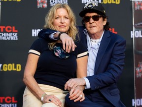 Actor Michael Madsen poses with wife actress DeAnna Madsen during his Hand and Footprint Ceremony at TCL Chinese Theatre on Nov. 16, 2020, in Hollywood, Calif.