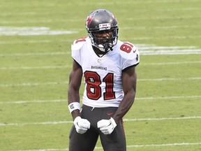 Buccaneers wide receiver Antonio Brown reacts in the fourth quarter at Bank of America Stadium in Charlotte, N.C., Sunday, Nov. 15, 2020.