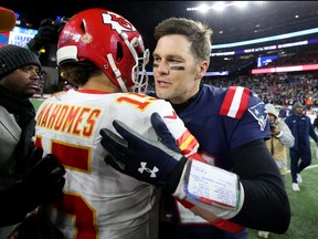 Kansas City Chiefs quarterback Patrick Mahomes (left) and New England Patriots quarterback Tom Brady chat after a game last season. Brady, who has since joined the Tampa Bay Buccaneers, will be looking to right the ship against Mahomes’ 9-1 Chiefs this weekend.