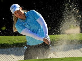 Brittany Lincicome plays a shot from the bunker on the third hole during the first round of the Pelican Women's Championship at Pelican Golf Club in Belleair, Fla., Nov. 19, 2020.