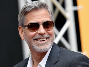 In this file photo taken on May 13, 2019 George Clooney poses during a photocall of the Catch-22 TV show in Rome.