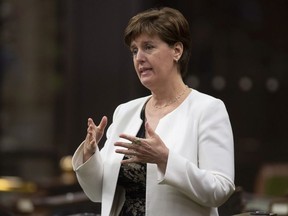 Minister of Agriculture and Agri-Food Minister Marie-Claude Bibeau rises during a sitting of the Special Committee on the COVID-19 Pandemic in the House of Commons, in Ottawa, Wednesday, June 3, 2020.