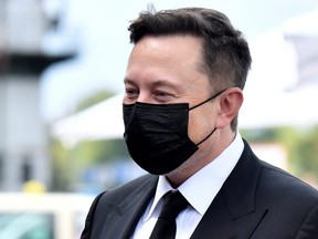 Elon Musk wears a protective mask as he arrives to attend a meeting with the leadership of the conservative CDU/CSU parliamentary group, in Berlin, Germany Sept. 2, 2020.