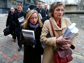 Geraldine Finucane (right), the widow of murdered Belfast solicitor Pat Finucane, arrives for a media conference with her children Katherine (2nd right), Michael (2nd left) and John (middle) in central London December 12, 2012.