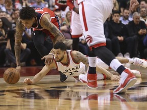 Fred VanVleet dives for a ball.