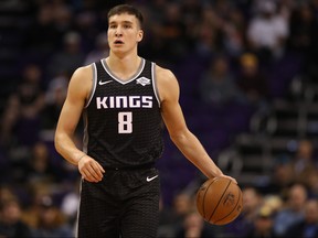 Bogdan Bogdanovic of the Sacramento Kings handles the ball during the first half of the NBA game against the Phoenix Suns at Talking Stick Resort Arena on December 4, 2018 in Phoenix, Arizona.