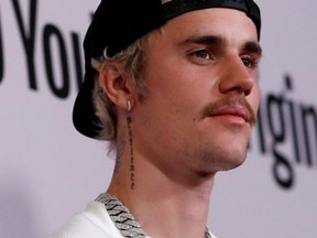 Justin Bieber poses at the premiere for the documentary television series "Justin Bieber: Seasons" in Los Angeles, Jan. 27, 2020.