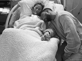 Chrissy Teigen and John Legend are seen inside the hospital after pregnancy complications, in this undated picture obtained from social media.