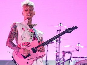 In this handout image courtesy of ABC, singer Machine Gun Kelly performs during the 2020 American Music Awards at the Microsoft Theatre on November 22, 2020 in Los Angeles.