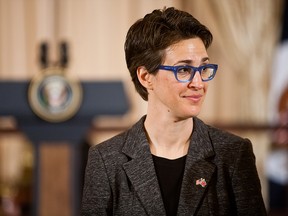 Television host Rachel Maddow arrives for a lunch hosted in honor of Prime Minister David Cameron at the State Department on March 14, 2012 in Washington.