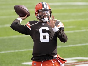 Cleveland Browns quarterback Baker Mayfield warms up before a game against the Las Vegas Raiders at FirstEnergy Stadium.