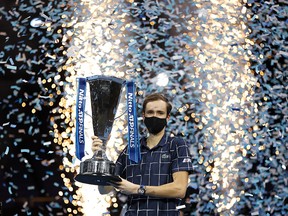 Daniil Medvedev lifts the trophy after beating Dominic Thiem during the Nitto ATP World Tour Finals at The O2 Arena on November 22, 2020 in London.