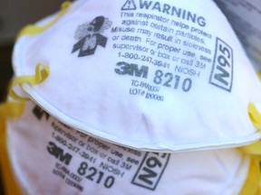 3M brand N95 particulate respirators are displayed on a table on July 28, 2020in San Anselmo, California.