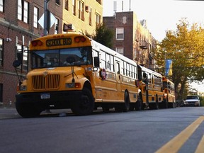 Buses are seen parked in the Brooklyn neighbourhood of Borough Park in New York City, Oct. 6, 2020.