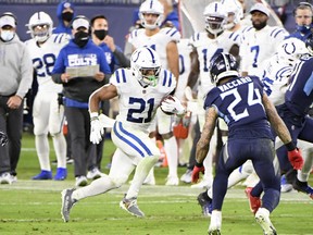 Indianapolis Colts running back Nyheim Hines runs the ball against the Tennessee Titans during the second half at Nissan Stadium in Nashville, Tenn., Nov. 12, 2020.