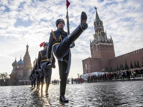 Russian honour guards march during the military parade at Red Square in Moscow on November 7, 2018.