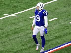 Colts punter Rigoberto Sanchez walks on the field prior to a game against the Packers at Lucas Oil Stadium in Indianapolis, Nov. 22, 2020.