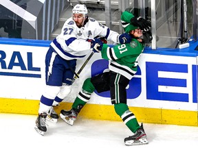 Ryan McDonagh of the Tampa Bay Lightning checks Tyler Seguin of the Dallas Stars during Game 6 of the 2020 NHL Stanley Cup Final at Rogers Place on September 28, 2020 in Edmonton.