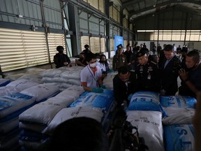 Officials view the seized 11.5 tonnes of ketamine, in the country's largest seizure ever, worth nearly 30 billion baht (~$991 million USD) at a warehouse in Chachoengsao, Thailand, November 12, 2020.