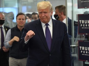 U.S. President Donald Trump visits his campaign headquarters in Arlington, Va., Tuesday, Nov. 3, 2020.