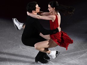 In this file photo taken on February 25, 2018 Tessa Virtue and Canada's Scott Moir perform during the figure skating gala event during the Pyeongchang 2018 Winter Olympic Games in Gangneung.