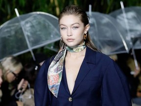 In this file photo taken on September 25, 2019 US model Gigi Hadid presents a creation by Lanvin during the Women's Spring-Summer 2020 Ready-to-Wear collection fashion show in Paris.