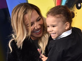 In this file photo taken on February 2, 2019 US actress Naya Rivera and son Josey Hollis Dorsey arrive for the premiere of "The Lego Movie 2: The Second Part" at the Regency Village theatre in Westwood, California.