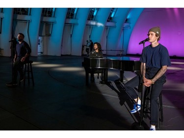 Singer Justin Bieber and duo Dan + Shay perform "10,000 Hours" from the Hollywood Bowl at the 54th annual Country Music Association Awards in Los Angeles, Calif., Nov. 11, 2020.