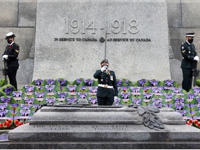 Honour guards take their positions prior to a ceremony at the National War Memorial on Remembrance Day in Ottawa, Ontario, Canada November 11, 2020. REUTERS/Blair Gable ORG XMIT: GGG-OTW100