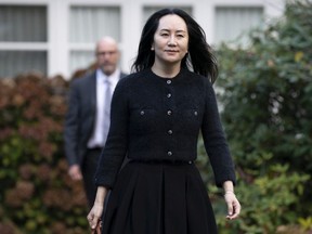 Chief Financial Officer of Huawei, Meng Wanzhou leaves her home in Vancouver, Friday, October 30, 2020.