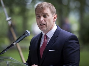 Premier of Newfoundland and Labrador Dr. Andrew Furey addresses the audience following the swearing-in ceremony on the grounds of Government House in St. John's on August 19, 2020.