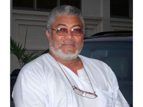 Ghana-Independence-Africa"  Jerry Rawlings, Ghana's former president, waits 23 February 2007, in front of his home.