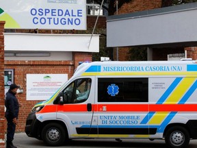 An ambulance is seen at the entrance of the Cotugno hospital, amid the outbreak of the coronavirus disease (COVID-19), in Naples, Italy, November 12, 2020.