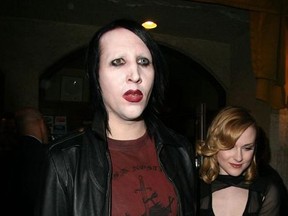 Marilyn Manson and Evan Rachel Wood leaving Bistro 990 during the Toronto International Film Festival.