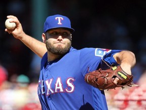 Lance Lynn of the Texas Rangers pitches against Boston Red Sox in the first inning at Fenway Park on June 12, 2019 in Boston, Massachusetts.