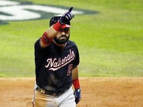 Adam Eaton of the Washington Nationals celebrates after he hits a solo home run against the Houston Astros during the fifth inning in Game Six of the 2019 World Series at Minute Maid Park on October 29, 2019 in Houston, Texas.