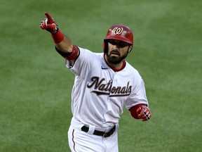 Adam Eaton of the Washington Nationals celebrates after hitting a home run against Gerrit Cole of the New York Yankees during the first inning in the game at Nationals Park on July 23, 2020 in Washington, DC.