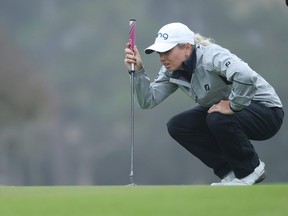 Lindsey Weaver of the United States looks over a putt on the second green during the final round of the 75th U.S. Women's Open Championship at Champions Golf Club Cypress Creek Course on Dec. 13, 2020 in Houston, Texas.