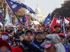 Supporters of U.S. President Donald Trump take part in a rally to protest the results of the election, in Washington, D.C., Dec. 12, 2020.