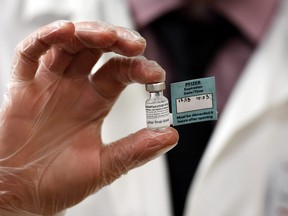 A vial of the Pfizer vaccine against COVID-19 used at The Reservoir nursing facility is shown in West Hartford, Conn., Dec. 18, 2020.