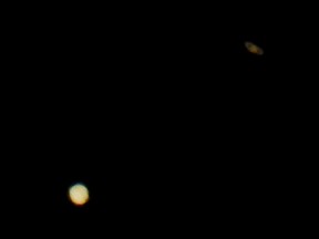 Jupiter (below) and Saturn (above) are pictured on the sky during the closest visible conjunction of them in 400 years, in La Linea de la Concepcion, southern Spain, Dec. 21, 2020.