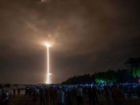 A Long March 5 rocket carrying China's Chang'e-5 lunar probe launches from the Wenchang Space Center on China's southern Hainan Island on Nov. 24, 2020, on a mission to bring back lunar rocks, the first attempt by any nation to retrieve samples from the moon in four decades.