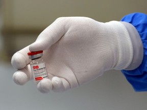 In this file photo taken on December 04, 2020, production of Russia's Gam-COVID-Vac vaccine against Covid-19 registered under trade name Sputnik V, developed by the Gamaleya Research Institute of Epidemiology and Microbiology in coordination with the Russian Defence Ministry, at the facility of Russia's biotech company BIOCAD in Strelna outside Saint Petersburg.